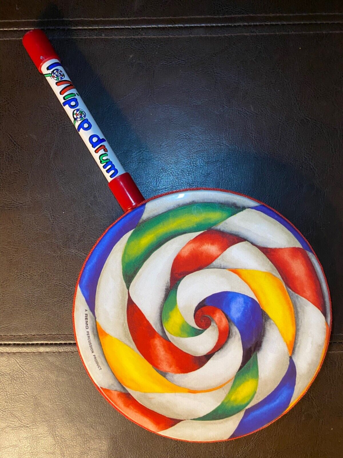 Remo Kid’s Percussion Lollipop Drum 8” Handle Multicolor Swirl Candy Handheld
